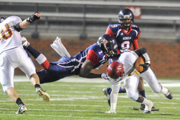 Escambia Academy's Kris Brown (6) is tackled during the AISA Class AAA State Championship Game help Friday, November 21, 2014 at Troy University's Veterans Memorial Stadium. Bessemer leads Escambia at the half, 14-7. (Photo/Joey Meredith)