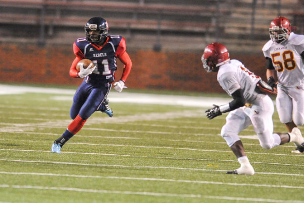 Bessemer Academy's Ryan Stoves (11) finds the gap during the AISA Class AAA State Championship Game help Friday, November 21, 2014 at Troy University's Veterans Memorial Stadium. Bessemer leads Escambia at the half, 14-7. (Photo/Joey Meredith)