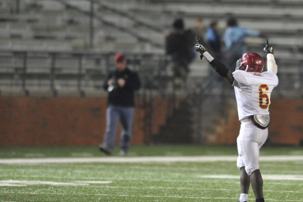Escambia Academy's Kris Brown (6) signals to the sideline after an interception to give Escambia the win during the AISA Class AAA State Championship Game Friday, November 21, 2014 at Troy University's Veterans Memorial Stadium. Escambia Academy came from behind in the fourth quarter to win 35-28. (Photo/Joey Meredith)