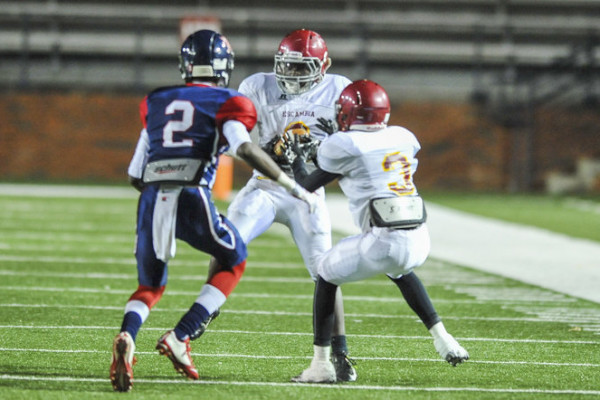 Escambia Academy's Kris Brown (6) hauls down an interception to solidify the win during the AISA Class AAA State Championship Game Friday, November 21, 2014 at Troy University's Veterans Memorial Stadium. Escambia Academy came from behind in the fourth quarter to win 35-28. (Photo/Joey Meredith)